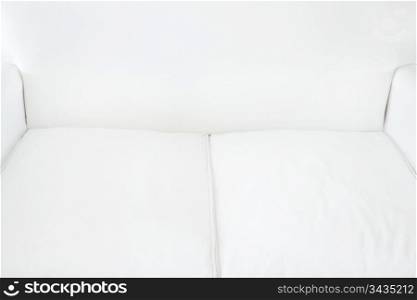white sofa on a white wall background