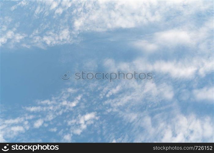 white soft cloud texture on blue sky backdrop