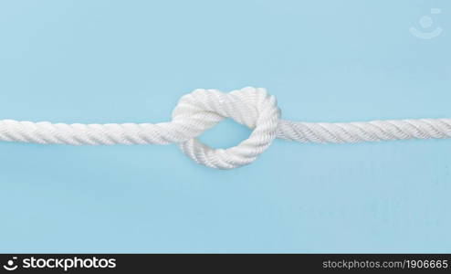 white solid rope with knot. High resolution photo. white solid rope with knot. High quality photo