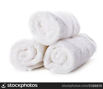White spa towels pile isolated on white background