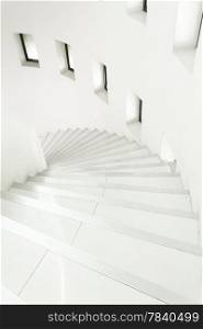 white Spiral stair concrete and window
