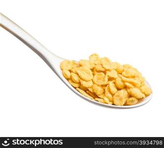 white spoon with corn flakes close up