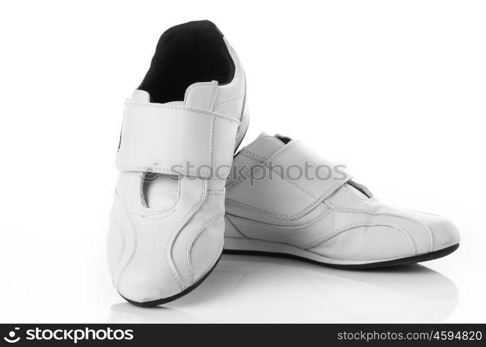 White sport shoes isolated on a white background