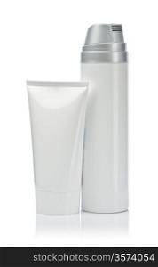 white spray bottle and white tube