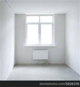White square room with window. Empty interior space