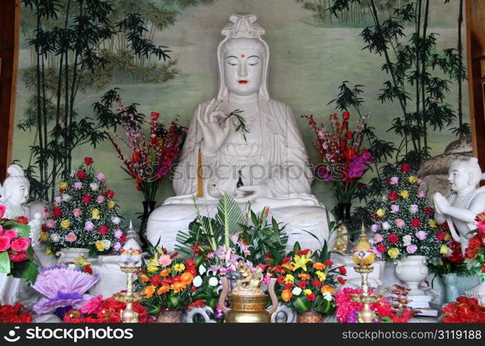 White statue of godness Guan Yin in buddhist temple, Putoshan, China