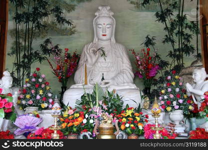 White statue of godness Guan Yin in buddhist temple, Putoshan, China