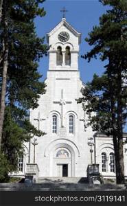 White stone church in Nikshich, Montenegro