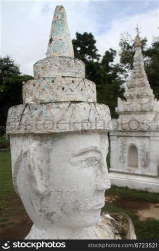 White stone head of spirit in Mingun, Myanmar