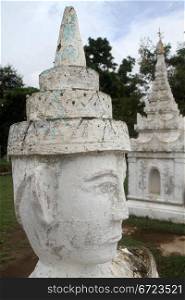White stone head of spirit in Mingun, Myanmar