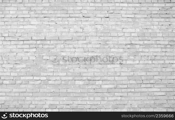 White stone wall of old bricks.