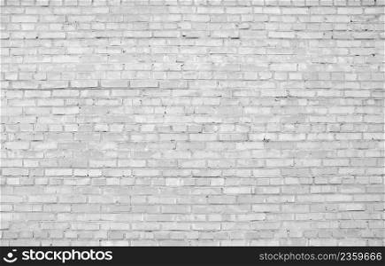 White stone wall of old bricks.