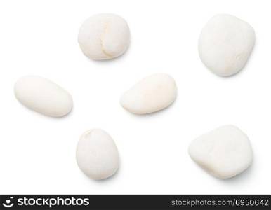White stones isolated on white background. Top view
