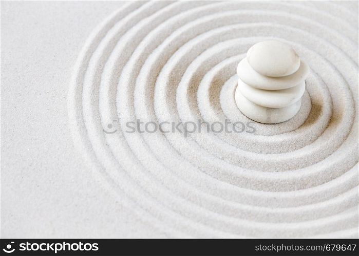 White stones pile in the sand. Zen japanese garden background scene. Zen japanese garden background