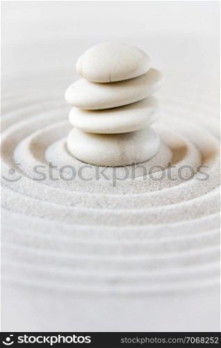 White stones pile in the sand. Zen japanese garden background scene. Zen japanese garden background