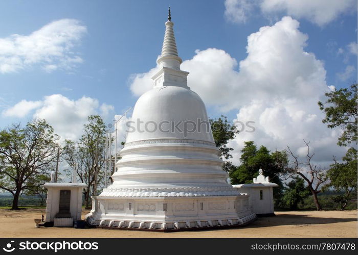 White stupa and clouds in monastery near Ampara, Sri Lanka