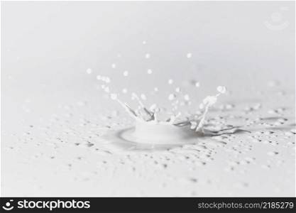 white surface with splash milk