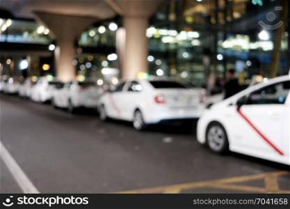 White taxi airport parking abstract blurry background