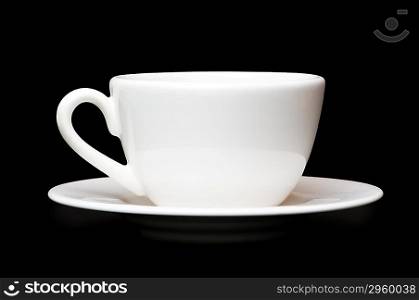 White tea cup isolated on black background