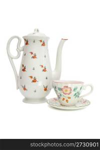White tea service consisting of high teapot and cup with saucer painted with dogroses isolated