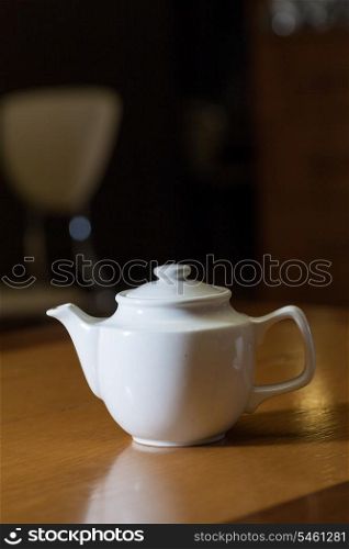 white teapot on table