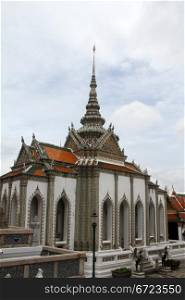 White temple with spire in Grand palace, Bangkok, Thailand
