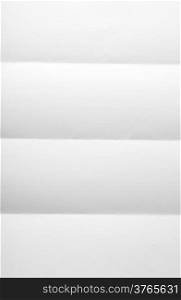 white textured sheet of paper folded in four