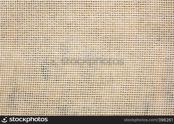 white Thai mulberry lace paper with a grid pattern against orange background