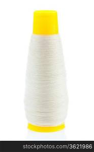 white thread on yellow bobbin