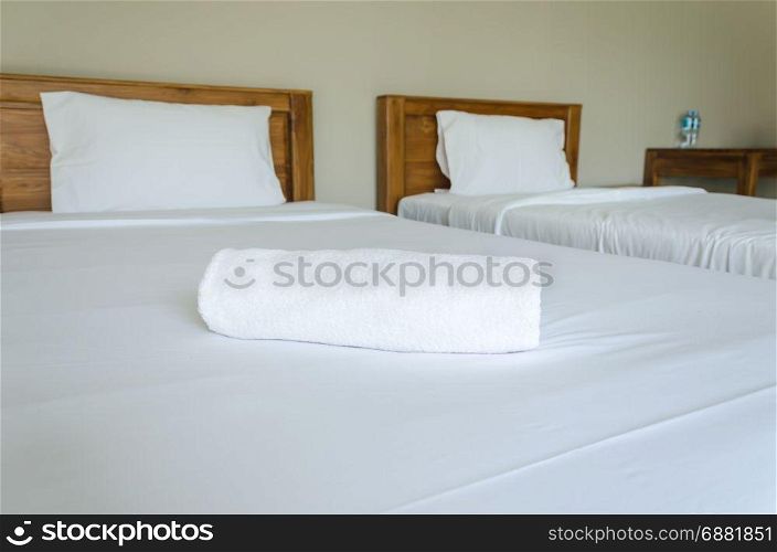White towel on the bed