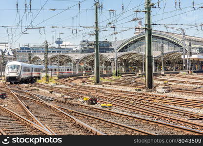 white train depart from the station Cologne Germany.