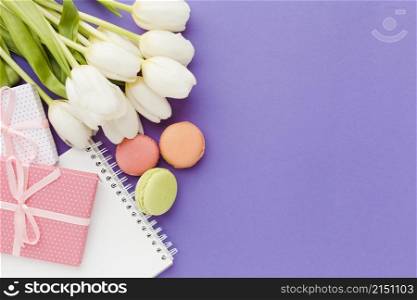 white tulip flowers sweets flat lay