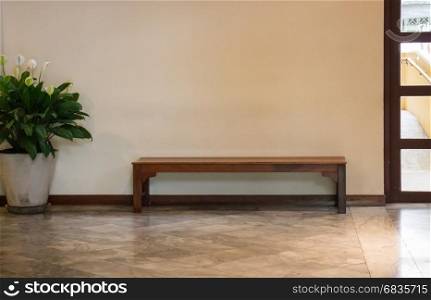 White Wall And Wooden bench, stock photo