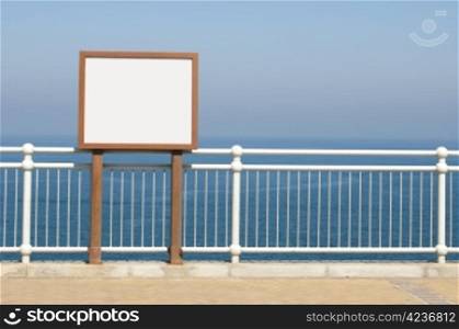White wall for messaging and sea on the background