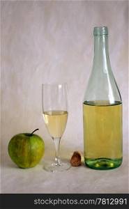 White wine and apple isolated on painted background