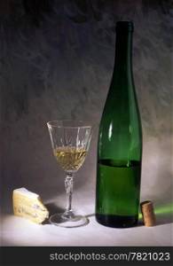 White wine and cheese isolated on painted background