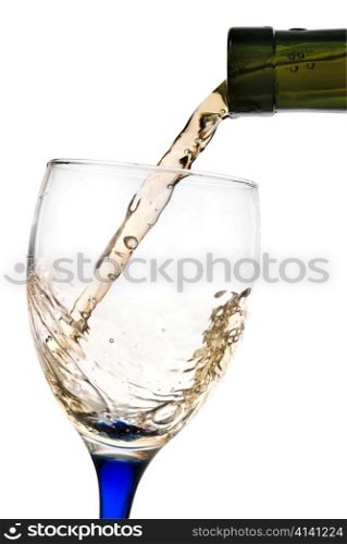 White wine flowing from a green bottle to a glass. All is isolated with a clipping path