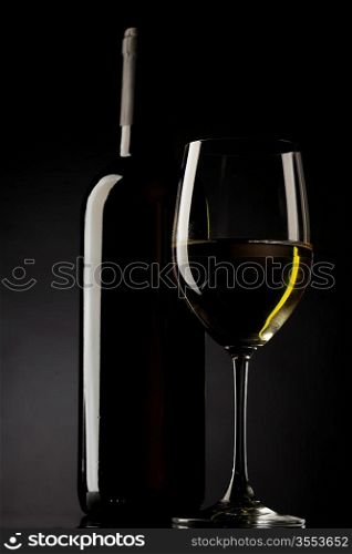 white wine glass silhouette black background