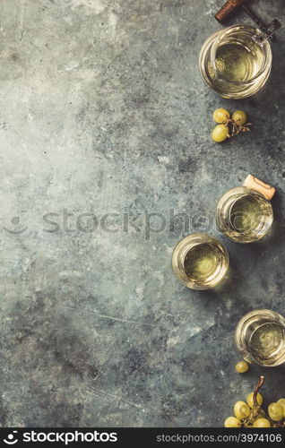 White wine on the stone background, close up, flat lay. White wine on the stone background, close up