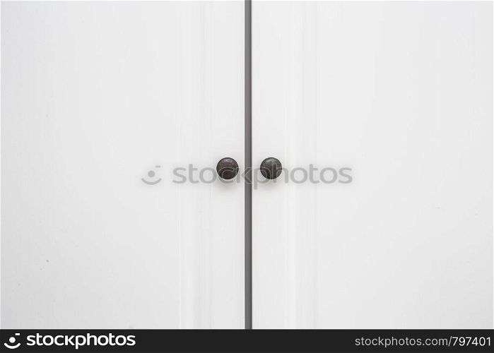 White wooden Closet doors close up background texture modern design. White wooden Closet doors close up background texture