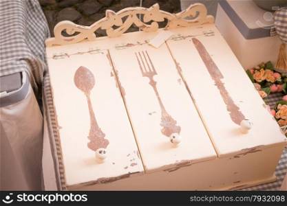 White wooden cutlery closed box