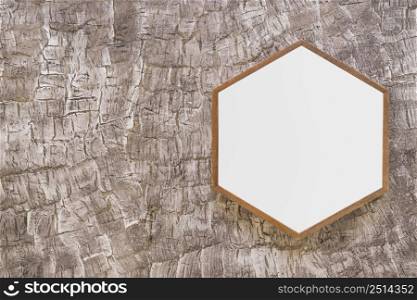 white wooden hexagon frame painted wall