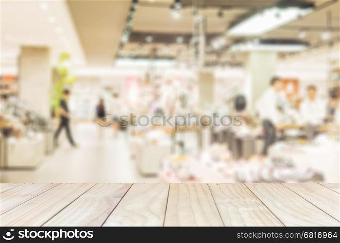 White wooden planks over blurred superstore background