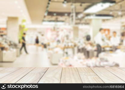 White wooden planks over blurred superstore background