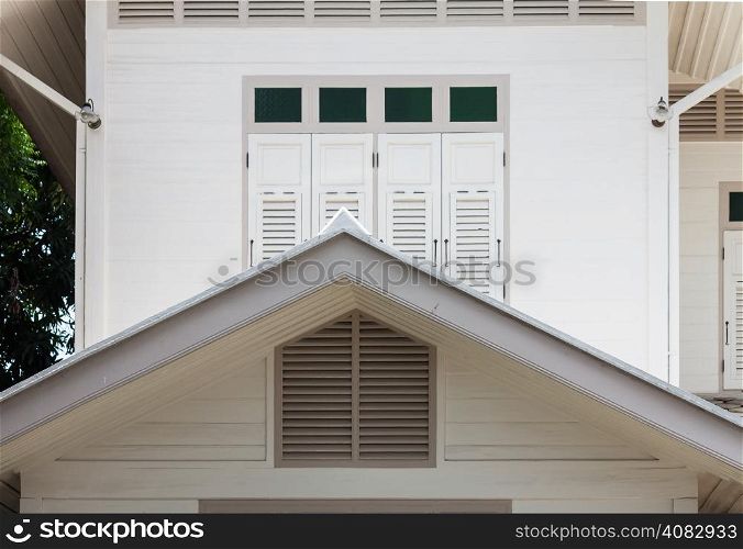 White wooden window and gable of vintage house in Bangkok,Thailand