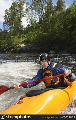 Whitewater Kayaker in Rapids