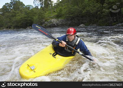 Whitewater Kayaker in Rapids