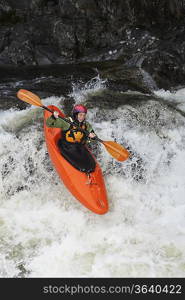 Whitewater Kayaker in Rapids