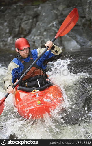 Whitewater Kayaker in Rapids