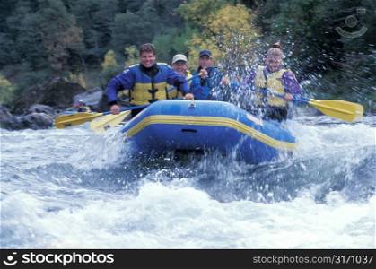 Whitewater Rafters Laughing in Exhilaration